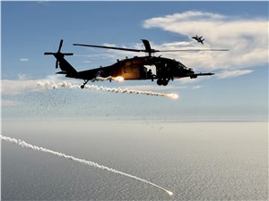 Air Force Tests Helicopter Countermeasures Over Water in Total Force Exercise